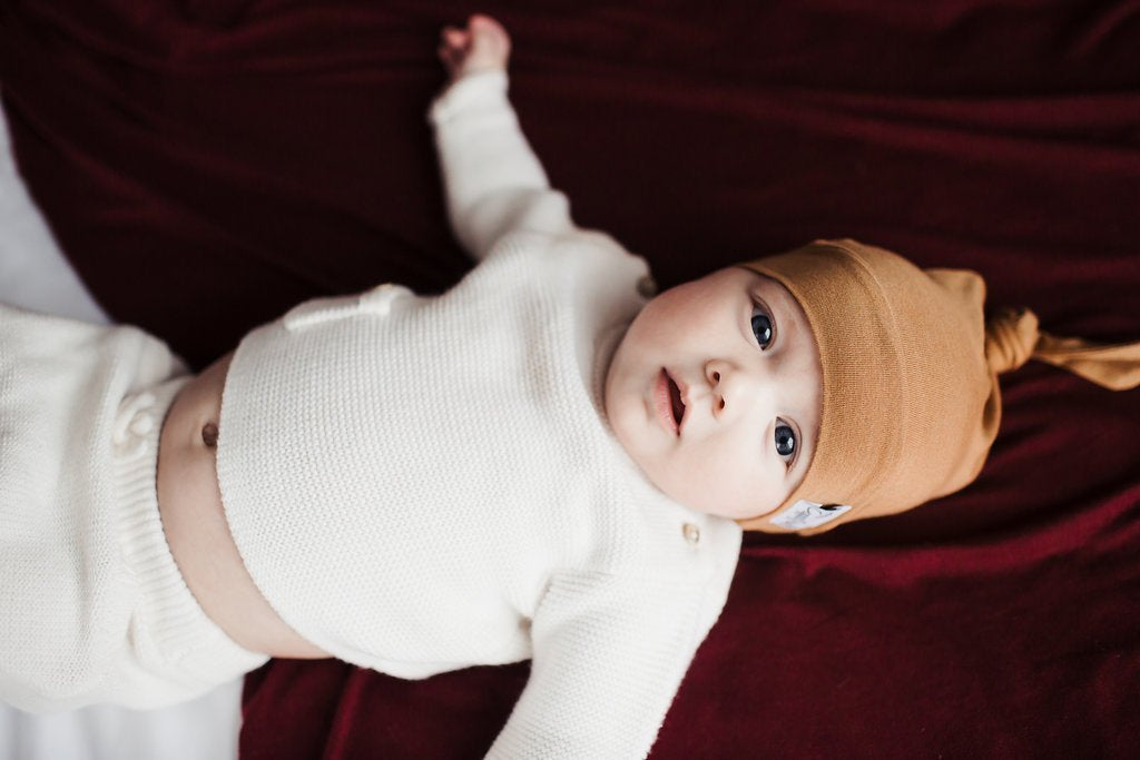 Copper Pearl Newborn Top Knot Hat - Camel