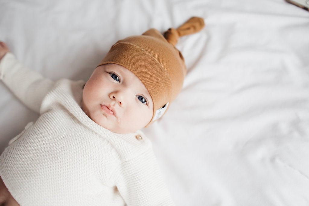 Copper Pearl Newborn Top Knot Hat - Camel